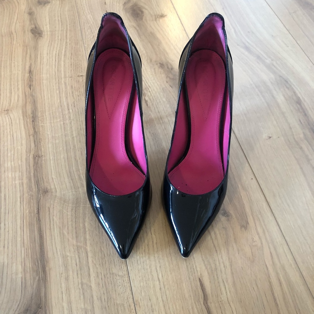 Black leather pumps